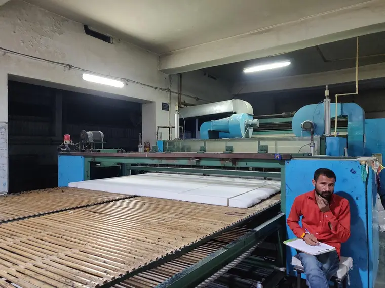 Bonded cushion sheet leaving the line