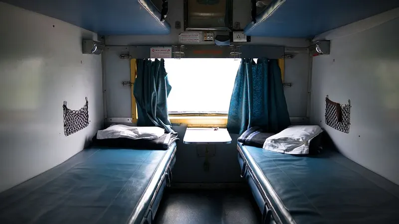 Sleeper coach interior with berths made up